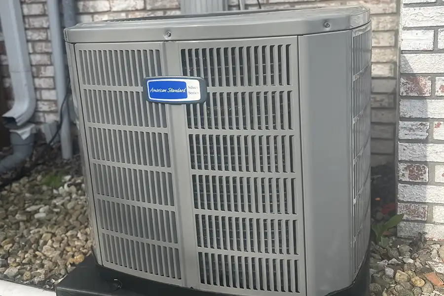 New residential HVAC system installed with a high-efficiency outdoor condenser